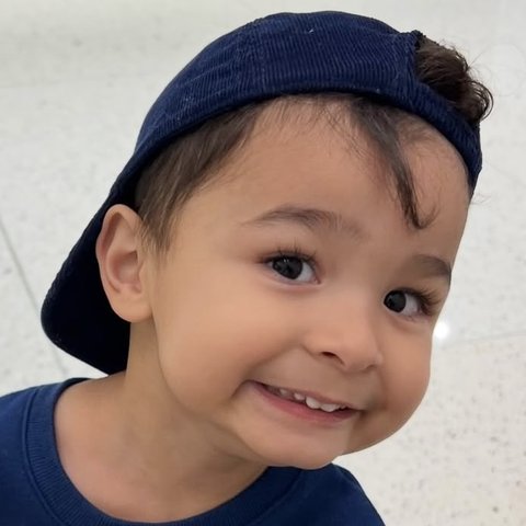 Ryan Moss smiling in his cap